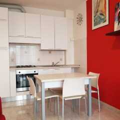 Апартаменты Sunset Apartment Римини в номере