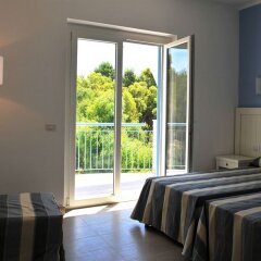 Toccacielo Hotel Village Нова-Сири комната для гостей фото 5