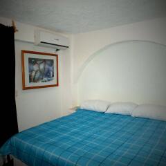 Отель Ikaro Suites Cancun Мексика, Канкун - отзывы, цены и фото номеров - забронировать отель Ikaro Suites Cancun онлайн комната для гостей