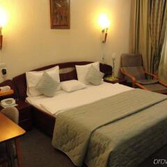 Отель Relax Comfort Suites комната для гостей фото 3
