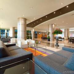 Отель Crowne Plaza Barcelona - Fira Center Испания, Барселона - 3 отзыва об отеле, цены и фото номеров - забронировать отель Crowne Plaza Barcelona - Fira Center онлайн интерьер отеля фото 2