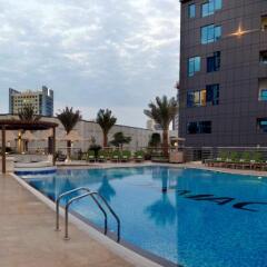 Отель Damac Maison De Ville Breeze бассейн фото 3