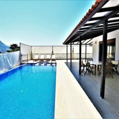 Villa Tepe by Akdenizvillam Турция, Патара - отзывы, цены и фото номеров - забронировать отель Villa Tepe by Akdenizvillam онлайн бассейн фото 3