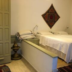 Mavi Kapi Butik Pansiyon Турция, Дикили - отзывы, цены и фото номеров - забронировать отель Mavi Kapi Butik Pansiyon онлайн удобства в номере