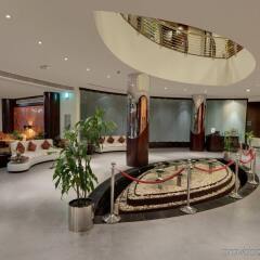 Signature Hotel Apartments & Spa интерьер отеля