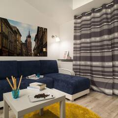 Отель Apartamenty Tww Stary Browar Польша, Краков - отзывы, цены и фото номеров - забронировать отель Apartamenty Tww Stary Browar онлайн комната для гостей фото 5