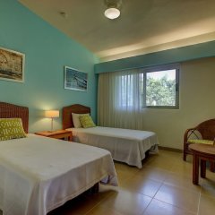 Отель Riviera Maya Suites Мексика, Плая-дель-Кармен - отзывы, цены и фото номеров - забронировать отель Riviera Maya Suites онлайн комната для гостей фото 3