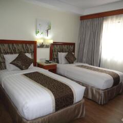 Отель Diamond Suites And Residences Филиппины, Лапу-Лапу - 1 отзыв об отеле, цены и фото номеров - забронировать отель Diamond Suites And Residences онлайн комната для гостей
