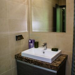 Отель Dusit Grand Condo View Jomtien Паттайя ванная