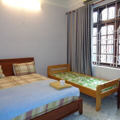 Отель Ms. Yang Homestay Вьетнам, Хошимин - отзывы, цены и фото номеров - забронировать отель Ms. Yang Homestay онлайн комната для гостей фото 4