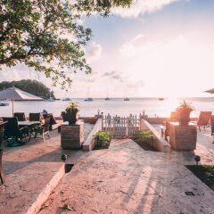 Отель Sunset Shores Beach Hotel Сент-Винсент и Гренадины, Остров Бекия - отзывы, цены и фото номеров - забронировать отель Sunset Shores Beach Hotel онлайн приотельная территория фото 2