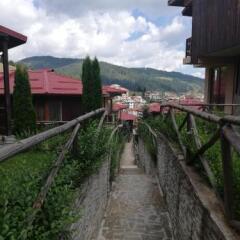 Отель Rodopi Houses Болгария, Чепеларе - отзывы, цены и фото номеров - забронировать отель Rodopi Houses онлайн приотельная территория фото 2