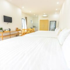 Отель Wanderlust Garden Stay & Cafe сейф в номере