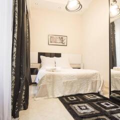 Отель Tbilisi Core: Aquarius Apartment Грузия, Тбилиси - отзывы, цены и фото номеров - забронировать отель Tbilisi Core: Aquarius Apartment онлайн комната для гостей фото 4