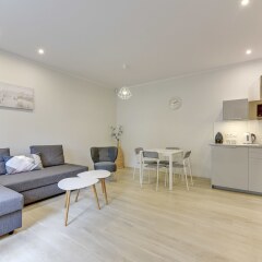 Апартаменты Lion Apartments - Haffnera 19 Сопот комната для гостей фото 3