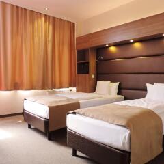 Отель Motel Plus Berlin комната для гостей