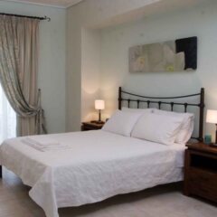 Отель Oasis Beach Hotel Греция, Агистри - отзывы, цены и фото номеров - забронировать отель Oasis Beach Hotel онлайн комната для гостей фото 3