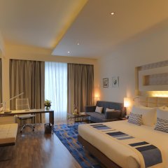 Отель Radisson Blu Hotel Greater Noida Индия, Большая Нойда - отзывы, цены и фото номеров - забронировать отель Radisson Blu Hotel Greater Noida онлайн комната для гостей фото 5