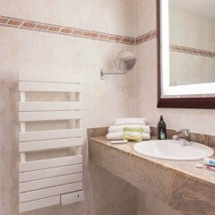 Отель Aparthotel Adagio Genève Saint Genis Pouilly Франция, Туари - отзывы, цены и фото номеров - забронировать отель Aparthotel Adagio Genève Saint Genis Pouilly онлайн ванная