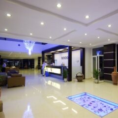 Aquabella Beach Hotel интерьер отеля