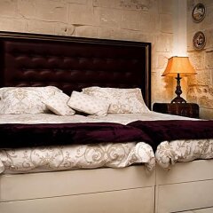 Отель Luciano Al Porto Boutique Accommodation Валетта комната для гостей фото 5