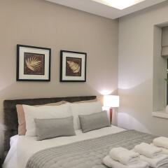Отель Trafalgar Luxury Suites комната для гостей фото 4