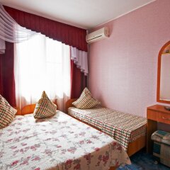 Гостевой дом Южный рай комната для гостей фото 4