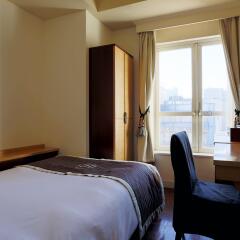 Отель Monterey Ginza Hotel Япония, Токио - 1 отзыв об отеле, цены и фото номеров - забронировать отель Monterey Ginza Hotel онлайн комната для гостей фото 2