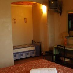 Отель Agriturismo Nuvolino - Guest House Монцамбано сейф в номере