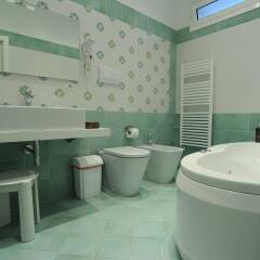 Отель Italiana Resort Италия, Флорида - отзывы, цены и фото номеров - забронировать отель Italiana Resort онлайн ванная фото 2