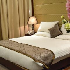Milestone Hotel Apartments комната для гостей фото 2