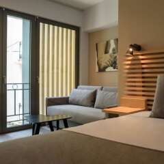 Отель Fos DownTown Suites Афины комната для гостей фото 12