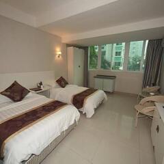 Апартаменты Yelinyuan Holiday Apartments комната для гостей фото 5