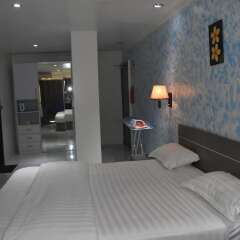 Апартаменты Galaxy Hotels & Apartments комната для гостей фото 4