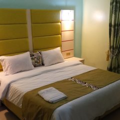 Отель De'Bliss Gold Hotel & Suite Нигерия, г. Бенин - отзывы, цены и фото номеров - забронировать отель De'Bliss Gold Hotel & Suite онлайн комната для гостей фото 2