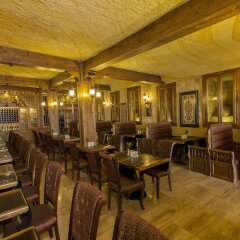 Отель Kayakapi Premium Caves Cappadocia гостиничный бар