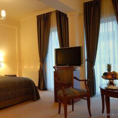 Отель Athens Atrium Hotel and Suites Греция, Афины - 2 отзыва об отеле, цены и фото номеров - забронировать отель Athens Atrium Hotel and Suites онлайн комната для гостей фото 2