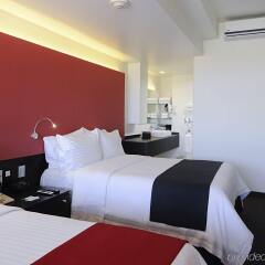 Отель Holiday Inn Dali Airport Мехико комната для гостей фото 2