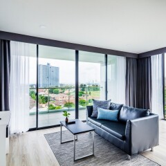 The Rizin Hotel & Residences комната для гостей фото 5