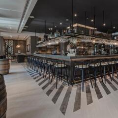Отель Al Bandar Rotana гостиничный бар фото 3