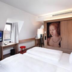Отель Sorat Hotel Saxx Nürnberg Германия, Нюрнберг - отзывы, цены и фото номеров - забронировать отель Sorat Hotel Saxx Nürnberg онлайн комната для гостей фото 2