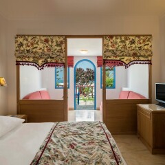 Отель Mitsis Rinela Beach Resort & Spa - All Inclusive удобства в номере