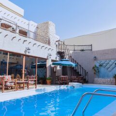 Отель Al Liwan Suites бассейн фото 3