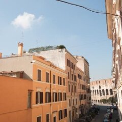 Отель Appartamento Santi Quattro 1 E 2 Colosseo