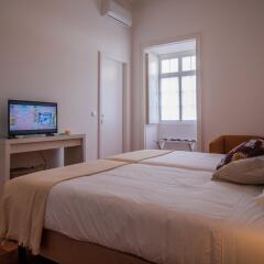 Отель CC Guest House - Ao Mercado Португалия, Понта-Делгада - отзывы, цены и фото номеров - забронировать отель CC Guest House - Ao Mercado онлайн комната для гостей