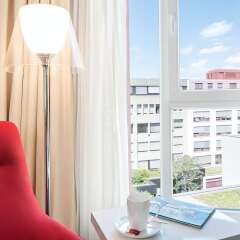Отель NH Collection Nürnberg City Германия, Нюрнберг - 2 отзыва об отеле, цены и фото номеров - забронировать отель NH Collection Nürnberg City онлайн комната для гостей фото 5