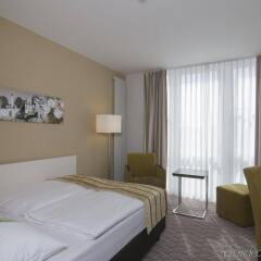 Отель Holiday Inn Munich-Unterhaching Германия, Унтерхахинг - 7 отзывов об отеле, цены и фото номеров - забронировать отель Holiday Inn Munich-Unterhaching онлайн комната для гостей фото 4