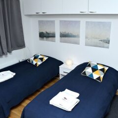 Отель Kotimaailma Apts Joensuu Koulukatu 21 Йоенсуу комната для гостей фото 2
