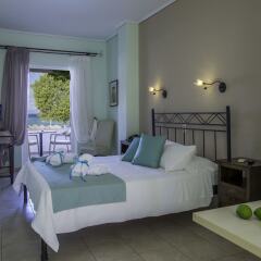 Отель Oasis Beach Hotel Греция, Агистри - отзывы, цены и фото номеров - забронировать отель Oasis Beach Hotel онлайн комната для гостей фото 5