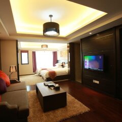 Апартаменты Chengdu Jianian CEO Apartment комната для гостей фото 3